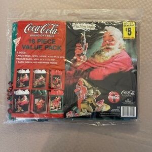 Coca-Cola vintage 18 piece NWT gift bag set from 2003. Sold at Dollar General.